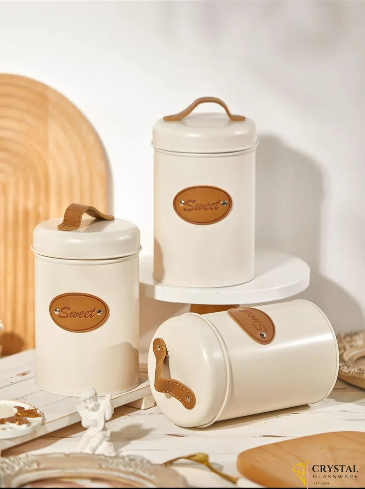 3 white galvanized iron canisters features airtight lids with PU leather handles for storing kitchen essentials like coffee, tea, or sugar